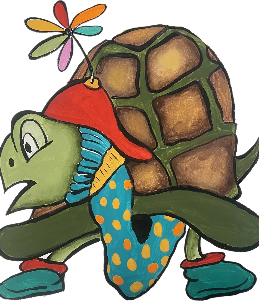 A smiling turtle in a red cap with a rainbow pinwheel on top