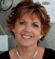 Linda, smiling